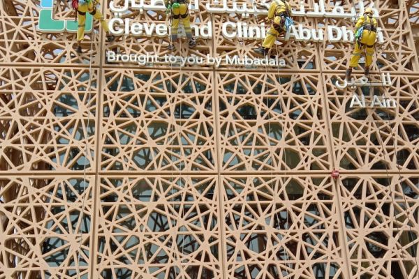 cleveland-clinic-abu-dhabi-brought-to-you-by-mubadala-window-cleaning-tetra-group-rope-access-frame-yellow-al-ain08805545-B94D-0C7D-867C-2A9693555E0B.jpeg
