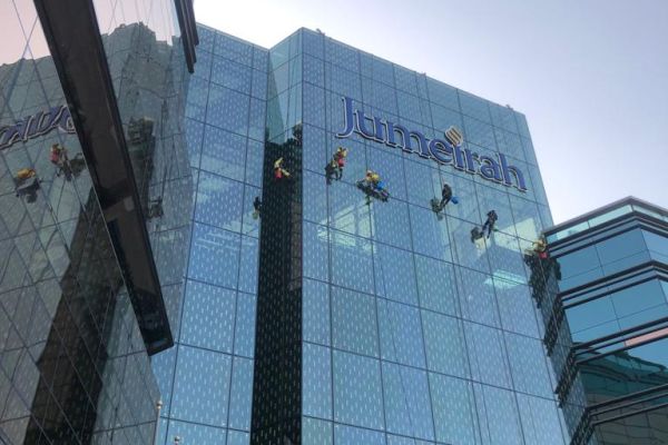 jumeirah-creekside-hotel-rope-access-cleaning-tetra-gulf-group-yellow-grew-overallsC51256CF-11B6-DB35-F110-308F0C3466BE.jpeg