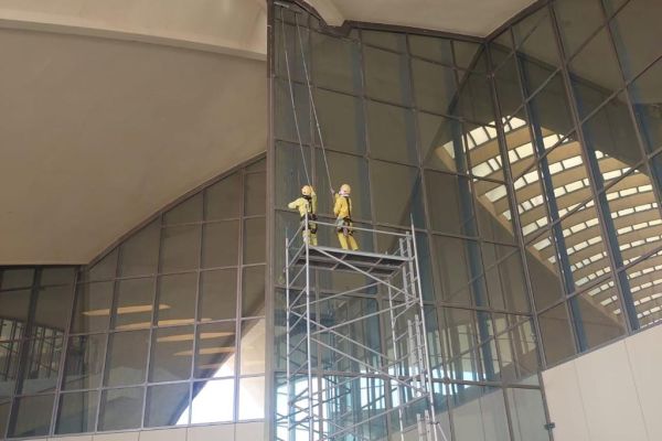 rope-access-cleaning-window-tetragulfgroup-cleaning-washing-yellow-overalls4A3DA251-D64F-AAE2-CE3F-466007D344A4.jpg