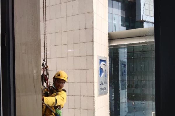 tetragulfgroup-rope-acces-cleaning-adnoc-headquaters-building-yellow2FFFA4FF-8D49-81F7-25AA-B4C7EC2D041B.jpeg